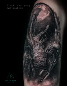 Black and grey realism tattoo on arm at Legendary Tattoos in Las Vegas, Nevada