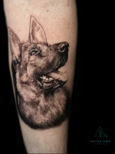 Black and Grey realism tattoo of a dog by Legendary Tattoos in Las Vegas.