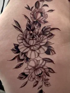Floral Fine Line tattoo by Legendary Tattoos in Las Vegas